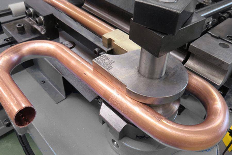 Как производится гибка металлических труб: технологические тонкости выполнения работ