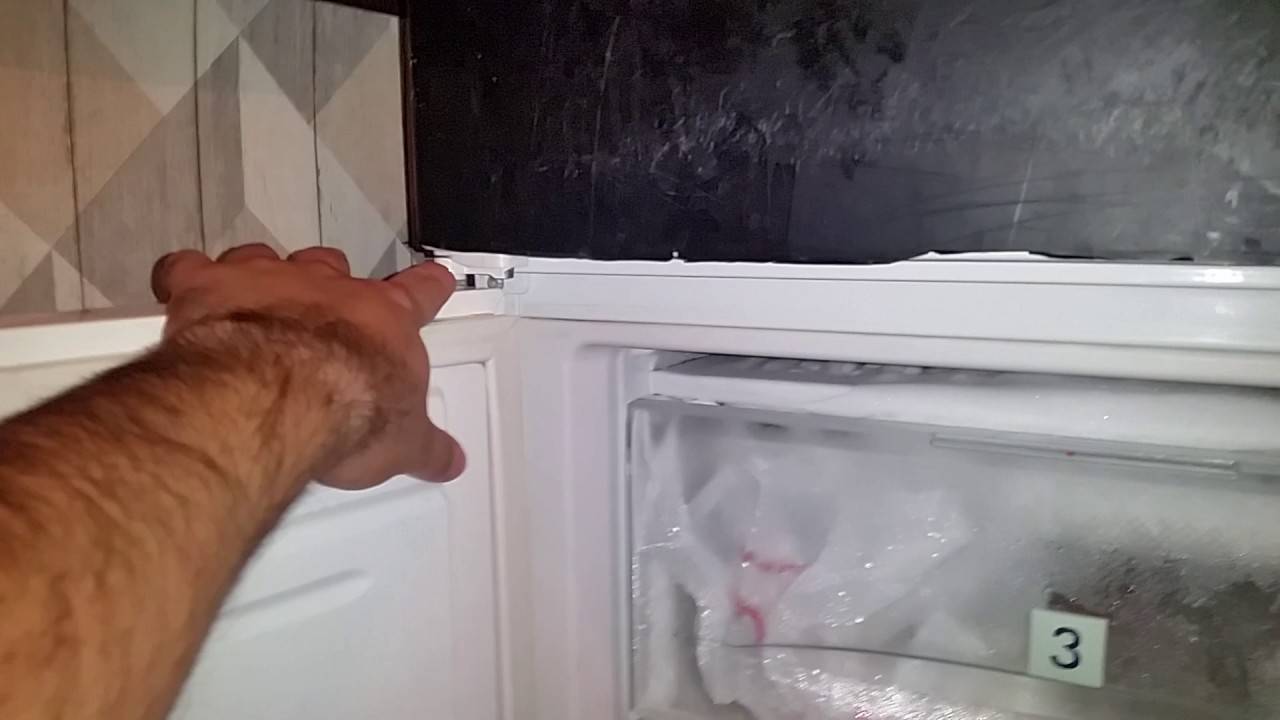 Холодильник: почему не прилегает дверца ?