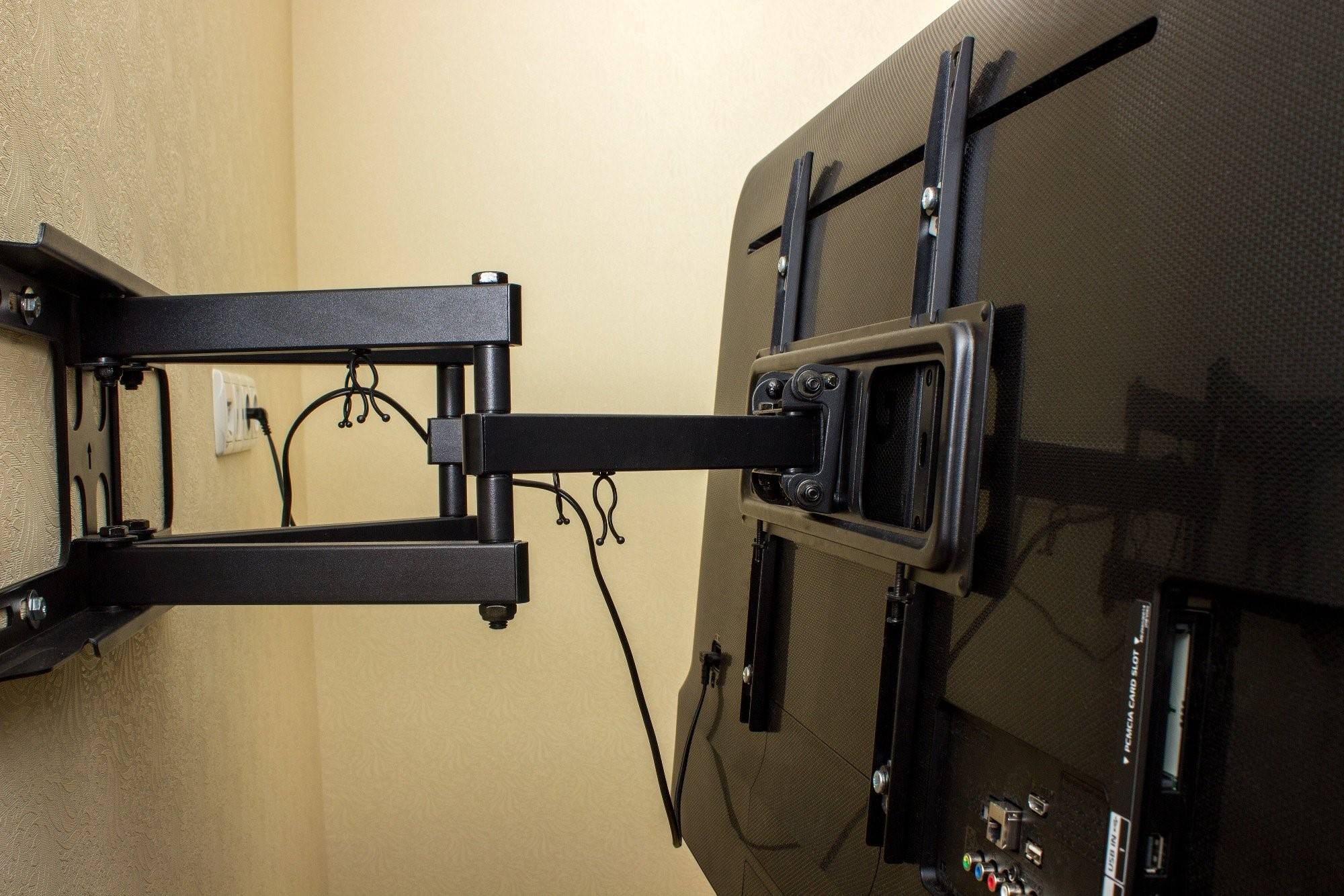 Как повесить телевизор на стену:  типы кронштейнов, установка на гипсокартон
